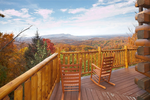 Deck with rockers at The Original American Dream, a 2 bedroom cabin rental located in Gatlinburg