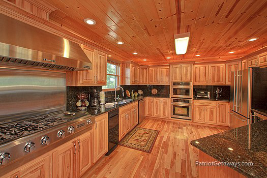 Kitchen with stainless steel appliances at Majestic Views, a 3 bedroom cabin rental located in Pigeon Forge