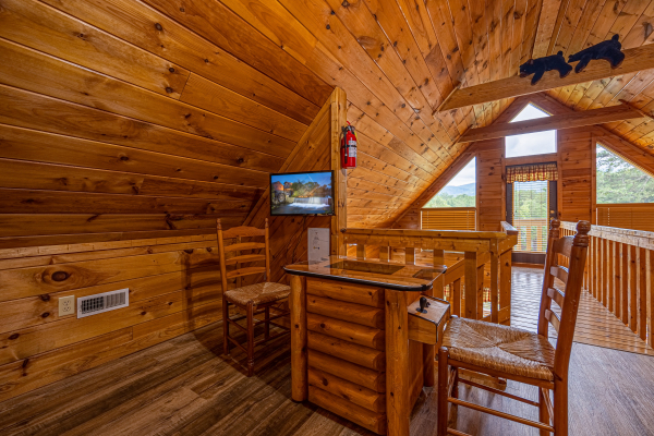 Arcade game at Cabin On The Hill, a 1 bedroom cabin rental located in Pigeon Forge