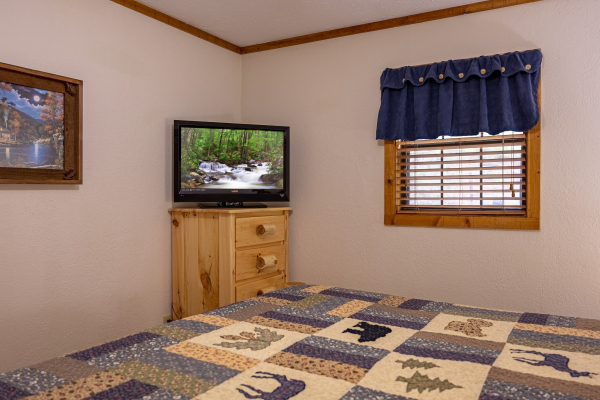 Bedroom amenities at Cabin On The Hill, a 1 bedroom cabin rental located in Pigeon Forge