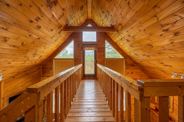 Hallway to deck at Cabin On The Hill, a 1 bedroom cabin rental located in Pigeon Forge