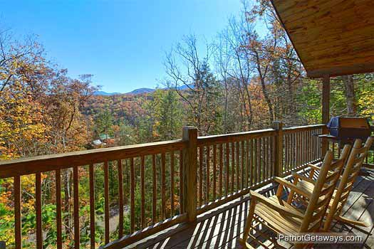 Main level deck with rockers at Precious View, a 1 bedroom cabin rental located in Gatlinburg