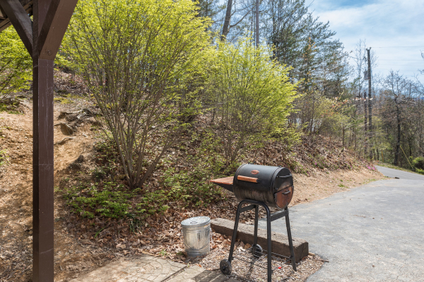 Grill off the parking area at Pine Splendor, a 5 bedroom cabin rental located in Pigeon Forge