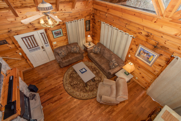 Looking down at the living room at The Cowboy Way, a 4 bedroom cabin rental located in Pigeon Forge
