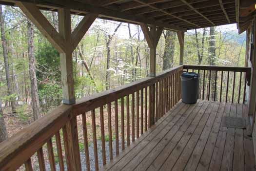 Front porch at Just Us, a 1 bedroom cabin rental located in Pigeon Forge