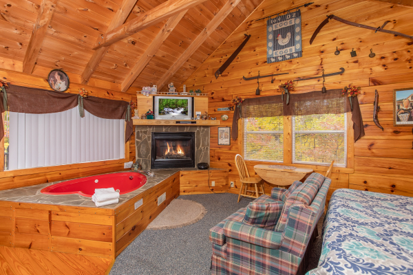 Studio cabin with jacuzzi and fireplace at All Shook Up, a 1 bedroom cabin rental located in Pigeon Forge