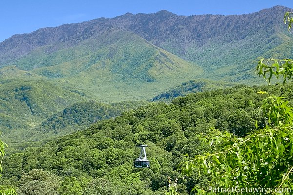 Arial tram view with mountains in the background seen from Chalet Mignon, an 8-bedroom cabin rental located in Gatlinburg