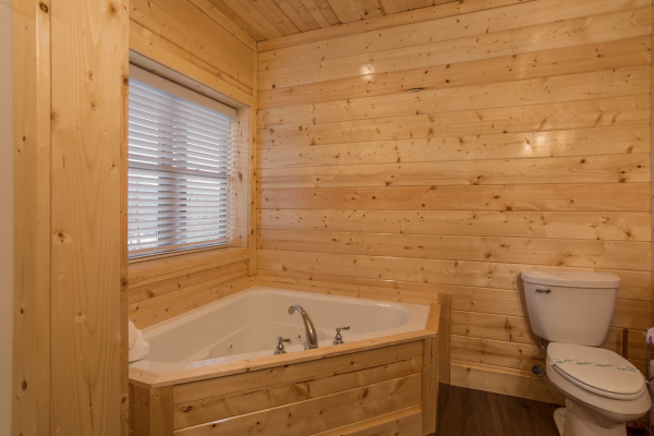 Jacuzzi in a bathroom at Splash Mountain Lodge a 4 bedroom cabin rental located in Gatlinburg