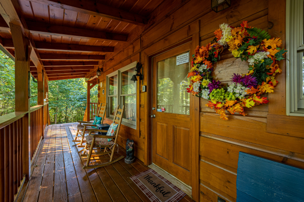 Porch with rocking chairs at Fox Ridge, a 3 bedroom cabin rental located in Pigeon Forge