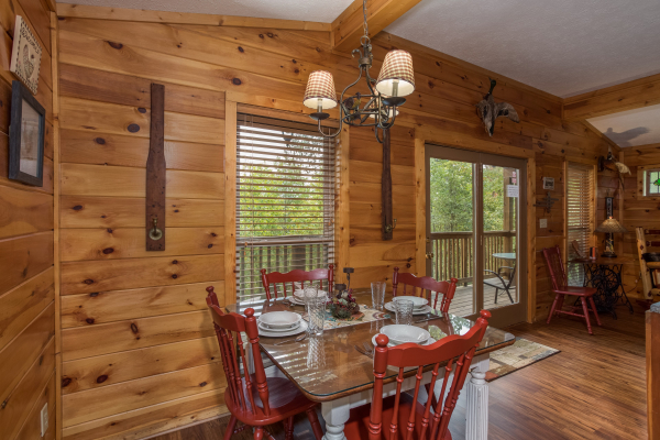Dining table for four at Bird's Eye View, a 2-bedroom cabin rental located in Gatlinburg
