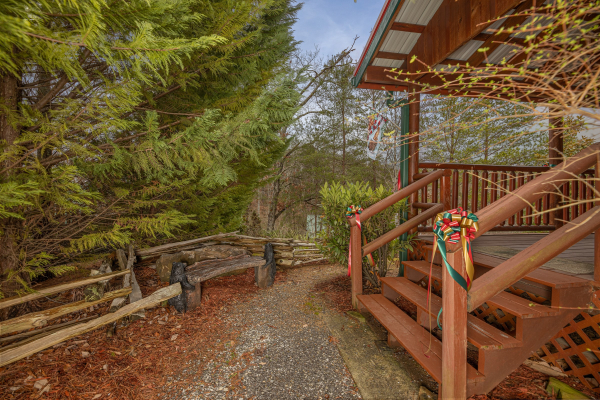 Stairs leading up the deck at Pigeon Forge Pleasures, a 3 bedroom cabin rental located in Pigeon Forge