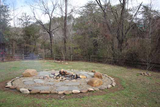 Fire pit and mountain view at Rustic Ranch, a 2 bedroom cabin rental located in Pigeon Forge