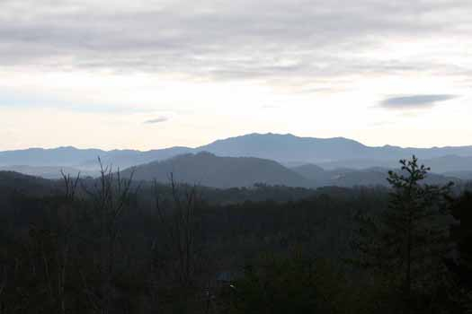 Take in the mountain panorama at Blue Mountain Views, a 1-bedroom cabin rental located in Pigeon Forge