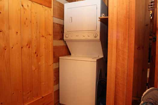 Stacked washer and dryer at Blue Mountain Views, a 1-bedroom cabin rental located in Pigeon Forge