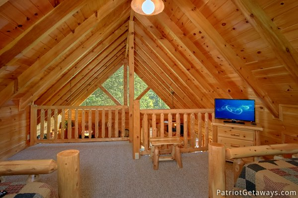 Looking out from the lofted bedroom at Alpine Sundance Trail, a 3 bedroom cabin rental located in Pigeon Forge