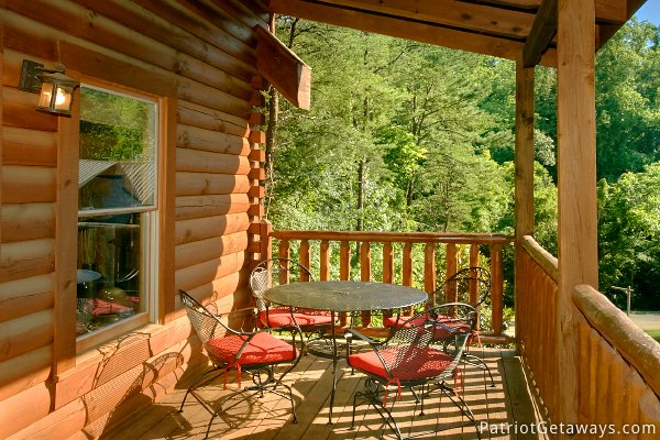 Outdoor patio furniture at Alpine Sundance Trail, a 3 bedroom cabin rental located in Pigeon Forge