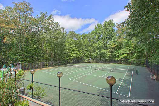 Chalet village resort tennis courts at Bushwood Lodge, a 3-bedroom cabin rental located in Gatlinburg