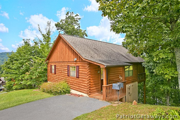 cabin exterior view with flat parking at always together forever a 1 bedroom cabin rental located in pigeon forge