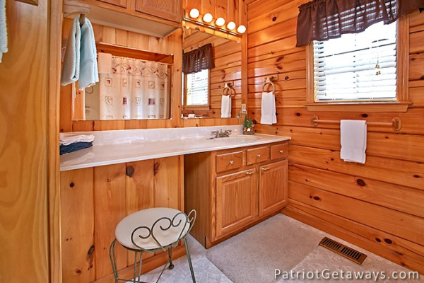 bathroom with vanity and sink at always together forever a 1 bedroom cabin rental located in pigeon forge