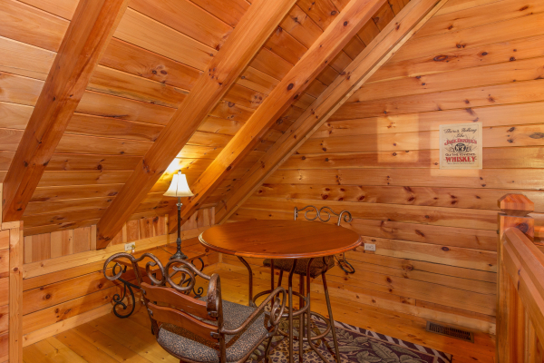 High table in the loft at A Honeymoon Haven, a 1 bedroom cabin rental located in Gatlinburg