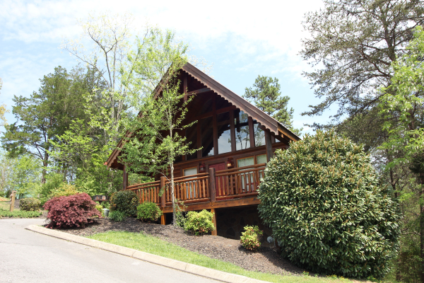 exterior view of the cabin from the road at alpine sunset thrill a 1 bedroom cabin rental located in pigeon forge