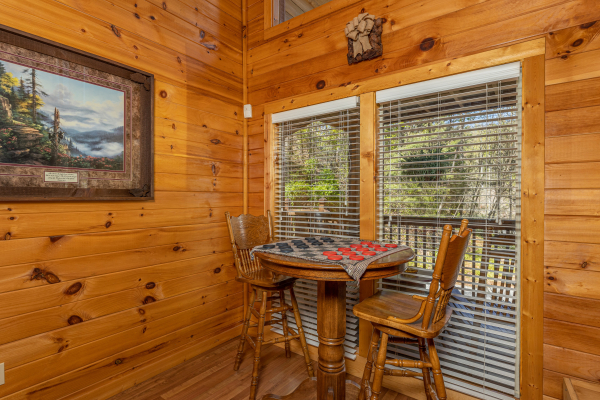 Checkers on a small table at Hidden Joy, a 1 bedroom cabin rental located in Gatlinburg