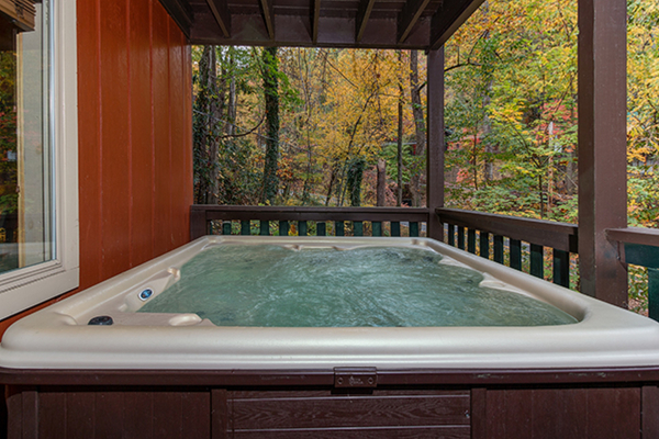Hot tub at Without A Paddle, a 3 bedroom cabin rental located in Gatlinburg