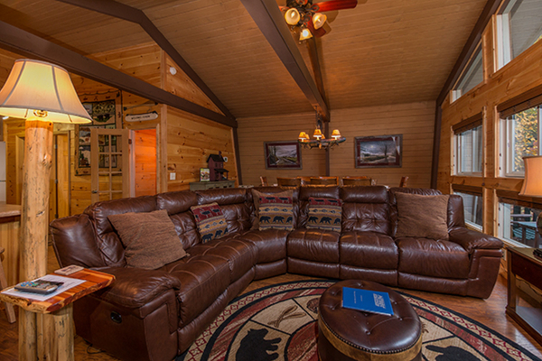 Sectional sofa in the living room at Without A Paddle, a 3 bedroom cabin rental located in Gatlinburg