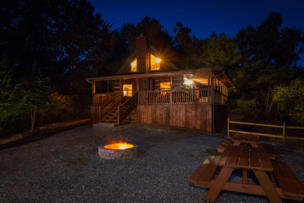 Cabin 3 at night at The Settlement, a 10 bedroom cabin rental located in Pigeon Forge