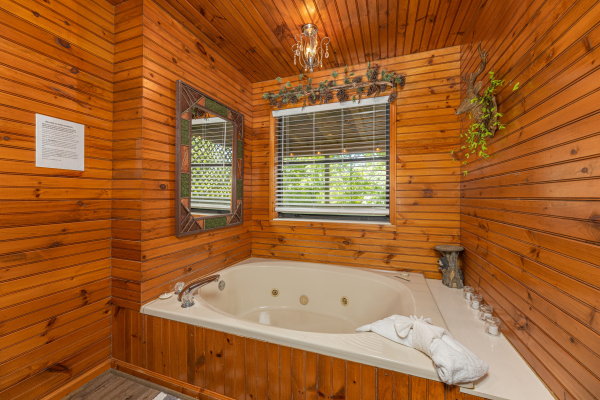 Jacuzzi tub at Magic Moments, a 2 bedroom cabin rental located in Pigeon Forge