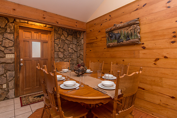 Dining table for six at Just for Fun, a 4 bedroom cabin rental located in Pigeon Forge