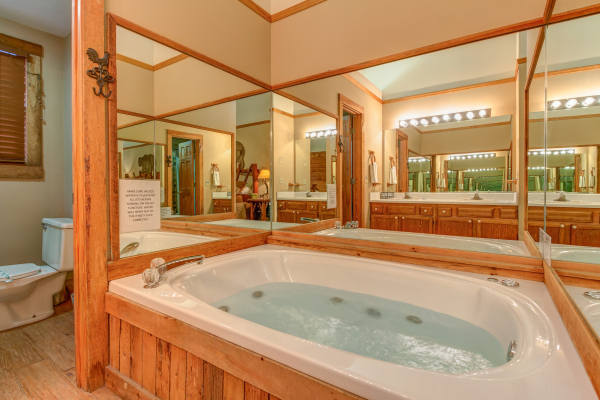 Jacuzzi in a bathroom at Just for Fun, a 4 bedroom cabin rental located in Pigeon Forge