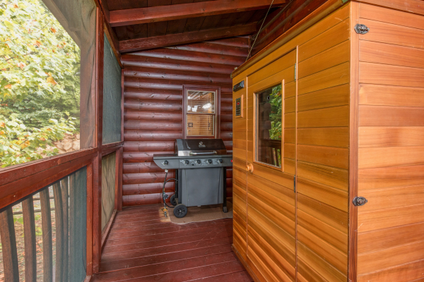 Sauna and grill on the deck at Hummingbird's Views, a 1 bedroom cabin rental located in Pigeon Forge