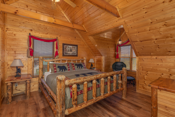 Upstairs bedroom at Grand Timber Lodge, a 5-bedroom cabin rental located in Pigeon Forge