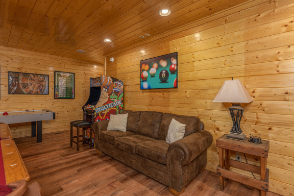 Arcade at Grand Timber Lodge, a 5-bedroom cabin rental located in Pigeon Forge