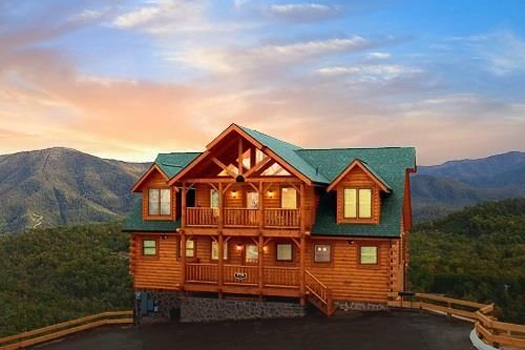 Sunset behind Grand Timber Lodge, a 5-bedroom cabin rental located in Pigeon Forge