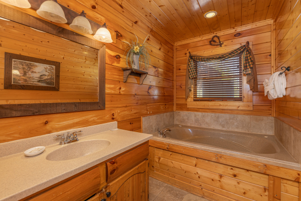 Bathroom at Grand Timber Lodge, a 5-bedroom cabin rental located in Pigeon Forge