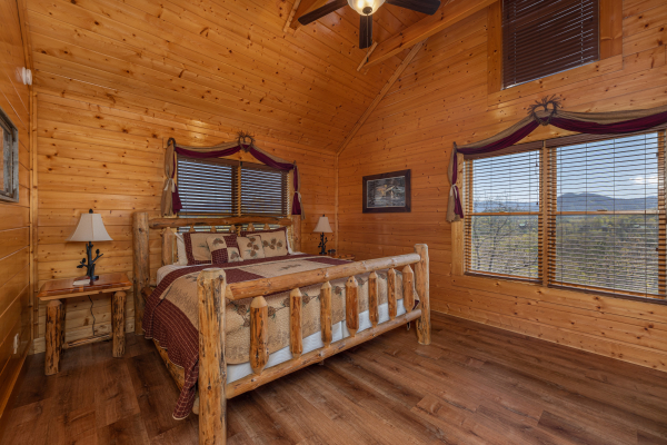 Bedroom with a view at Grand Timber Lodge, a 5-bedroom cabin rental located in Pigeon Forge