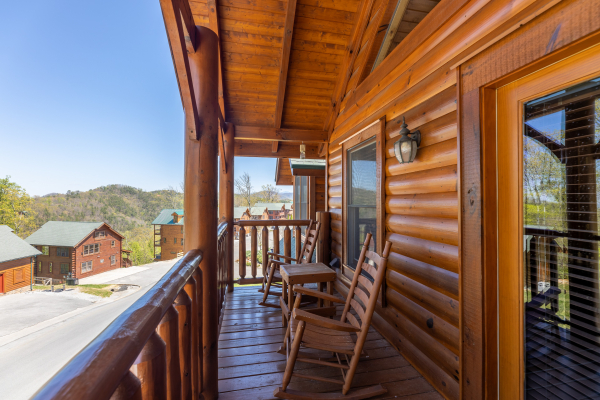 Deck rocking chairs at Grand Timber Lodge, a 5-bedroom cabin rental located in Pigeon Forge