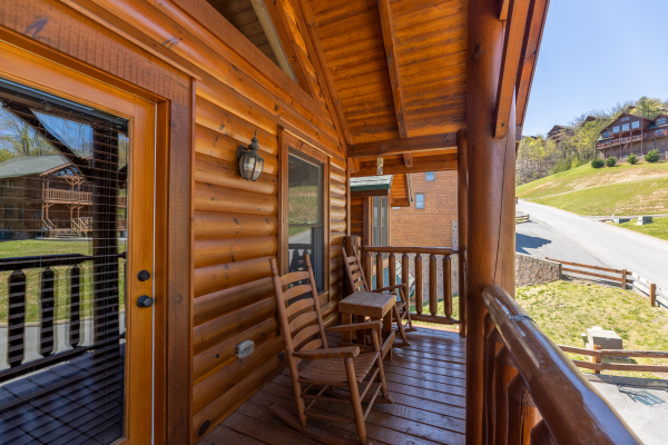 Deck at Grand Timber Lodge, a 5-bedroom cabin rental located in Pigeon Forge