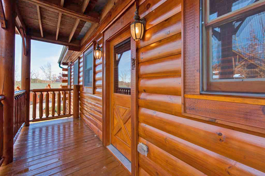 Entry door at Grand Timber Lodge, a 5-bedroom cabin rental located in Pigeon Forge