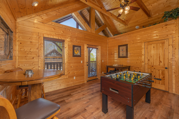 Foosball at Grand Timber Lodge, a 5-bedroom cabin rental located in Pigeon Forge