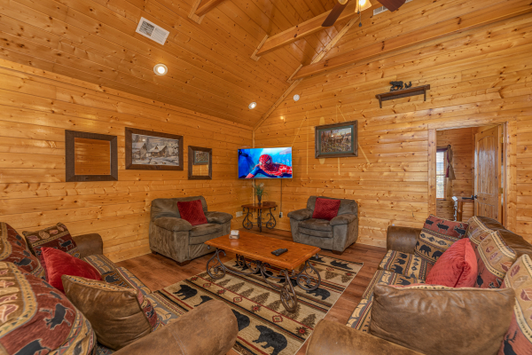 Living room  at Grand Timber Lodge, a 5-bedroom cabin rental located in Pigeon Forge
