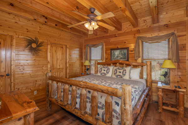 Log furniture bedroom  at Grand Timber Lodge, a 5-bedroom cabin rental located in Pigeon Forge