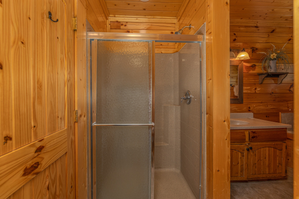 Shower  at Grand Timber Lodge, a 5-bedroom cabin rental located in Pigeon Forge