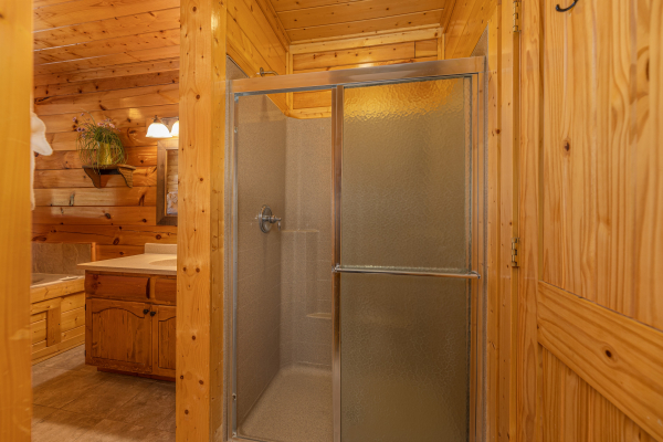 Shower at Grand Timber Lodge, a 5-bedroom cabin rental located in Pigeon Forge