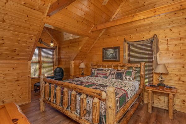 Bedroom at Grand Timber Lodge, a 5-bedroom cabin rental located in Pigeon Forge