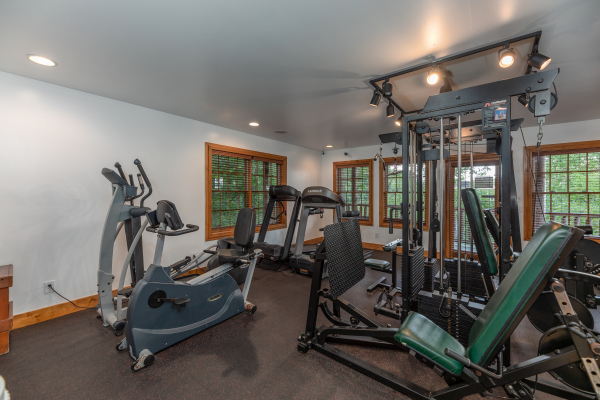 Exercise room for guests at Grand Timber Lodge, a 5 bedroom cabin rental located in Pigeon Forge