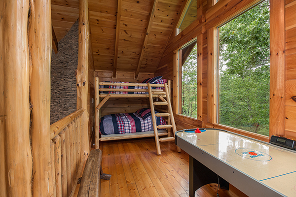 Loft bunks at Bearfoot Paradise, a 3-bedroom cabin rental located in Pigeon Forge