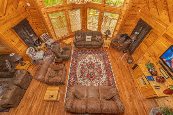 Looking down a the living room at Smokies Paradise Lodge, a 5 bedroom cabin rental located in Pigeon Forge